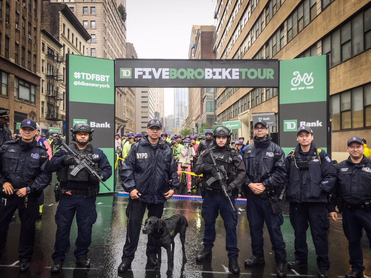 NYPDCT's tweet photo. Rain or shine, our officers are out keeping everyone riding the TD 5 Boro Bike Tour safe. You can see them posted along the route from start to finish. #TDFBBT https://t.co/lIVjp2v9nH