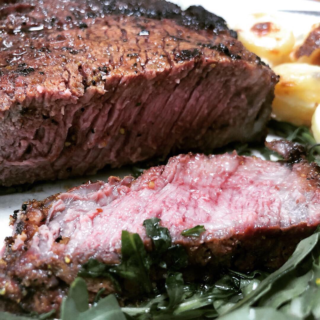 TheSmokeyCarter's tweet photo. 18oz ribeyes certainly got the spot! Reverse seared with a little oak. Used @MEATERmade to cook to the perfect temp. Served on top of rocket with gratin potatoes from @AldiUK on the side 👌. Seriously good 😋 #steak #ribeye https://t.co/mCYWSmJvbK