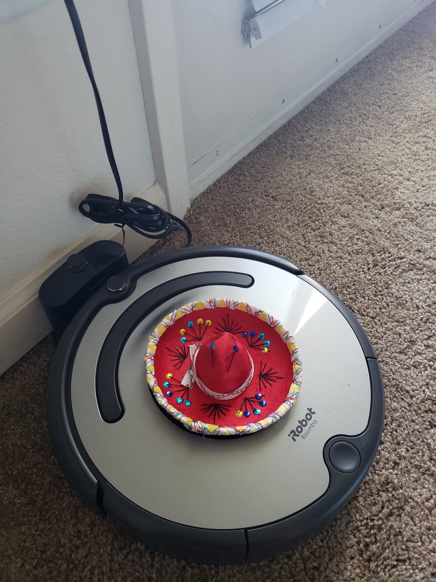 Cbuzzard4's tweet photo. I've started doing this thing where I "dress up" my roomba to celebrate holidays. I'm not really sure what this says about how things are going in my life right now or my overall mental state....but anyway, happy Cinco de Mayo https://t.co/o2UbuKdFxR