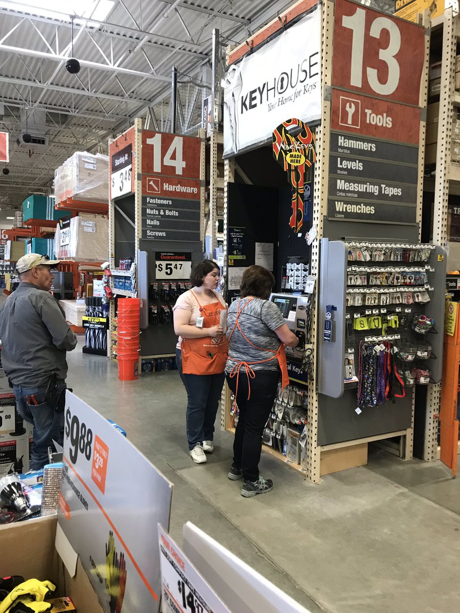 WarnockTimothy's tweet image. Cashier Corinne teaching a new cashier how to make keys. Thank you for all you do!