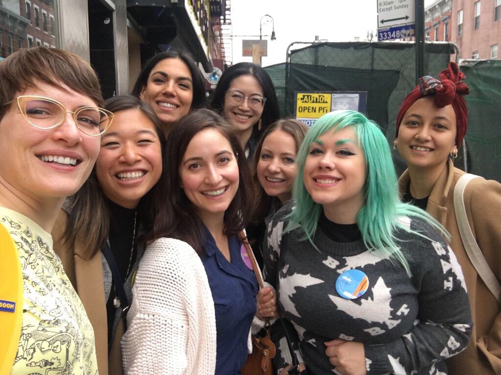 Selfie of 8 women outside