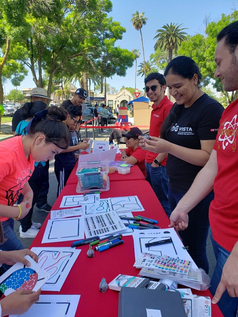 ScienceInOurCo1's tweet photo. Students and parents learn about pH and Ozobots among other activities at the Earth and Science Festival. #StanSTEMAmbassadors #Stanservicelearning #Stanstate #AmeriCorpsVISTA https://t.co/so4JjJrFVS
