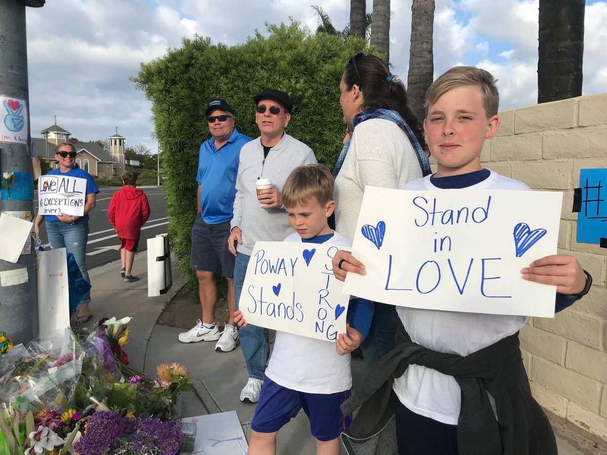 JustinaReports's tweet photo. STAND IN LOVE. People gathering to show their continued support for the Chabad of Poway #LiveOnFox5 #PowayStrong โฆ@fox5sandiegoโฉ https://t.co/wRVCYLyDOj