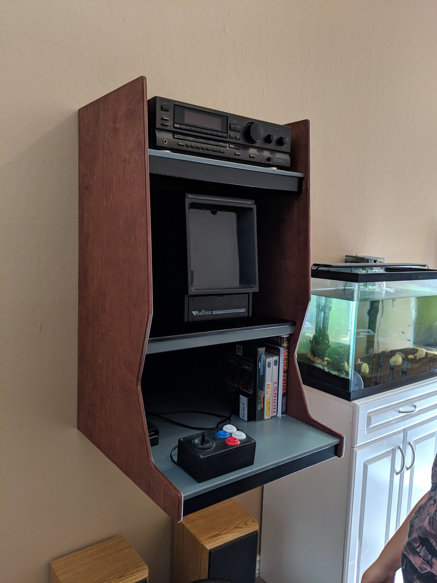avi_physics's tweet photo. @lazygamereviews I thought you might like my custom retro console booth. #forthewoodgrain #Vectrex https://t.co/g06rZAZV7I