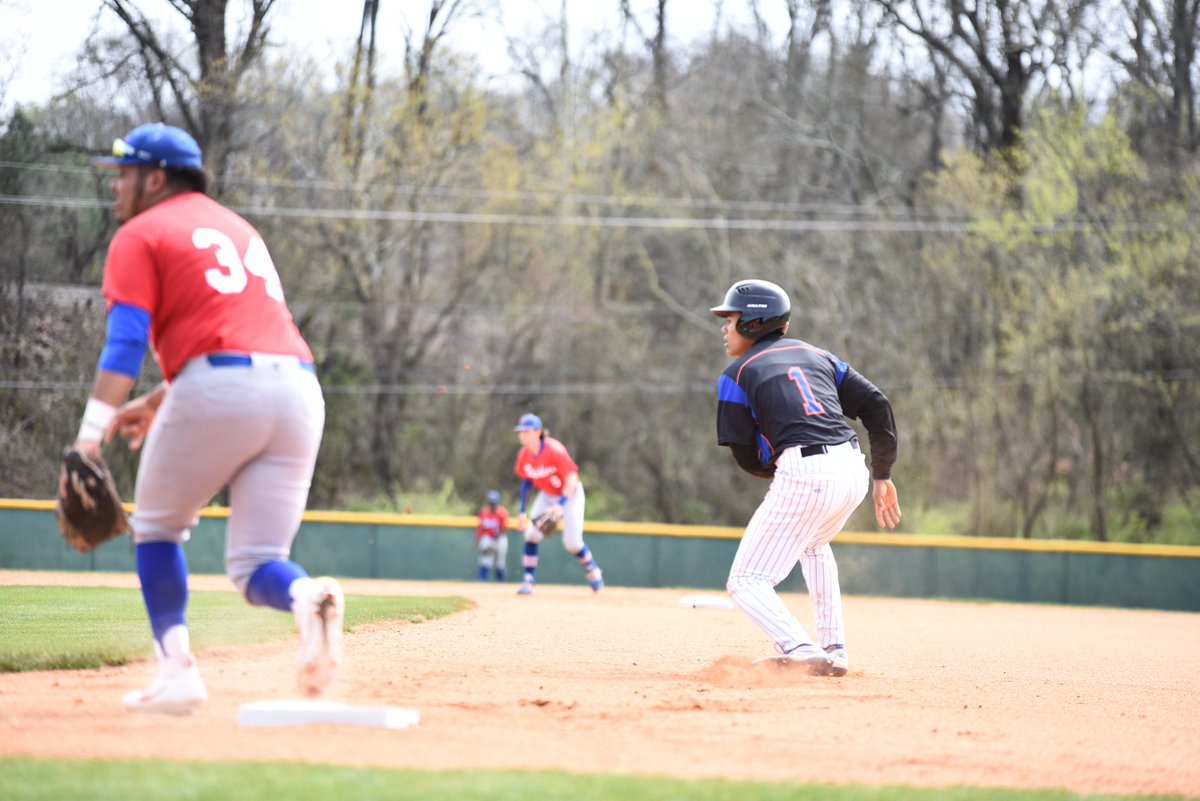Chattanooga State baseball player running bases.