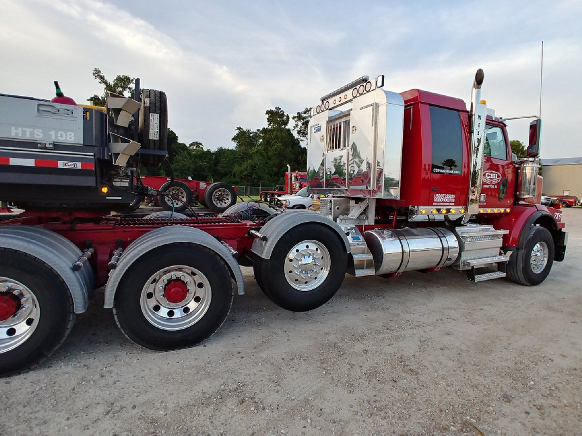 WstrnStarTrucks's tweet photo. Thanks to #StarGazer Jason from Houston WST for sharing these photos of this red 123 BBC #4900SF heavy hauler. Powered by a @DemandDetroit #DD16 600 HP. Along with the Eaton 18 speed, another 2 speed Spicer gear box was added for more torque. Beautiful AND tough. #StarNation https://t.co/OIbRe0HjN3