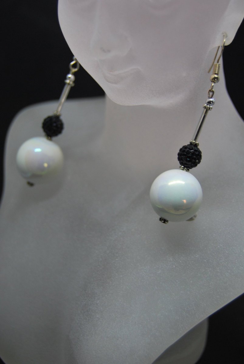 Excited to share this item from my #etsy shop: White Ceramic Ball and Black Shamballa Earrings on Silver. Handmade in the UK. etsy.me/2VkqYI8
#ceramicearrings #potteryearrings #whitepottery #earrings #etsy
