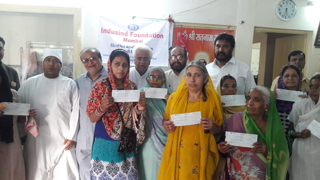 IndusindF's tweet photo. Distributing pension to senior citizens of Ujjain for first time https://t.co/3K1mRol1XX