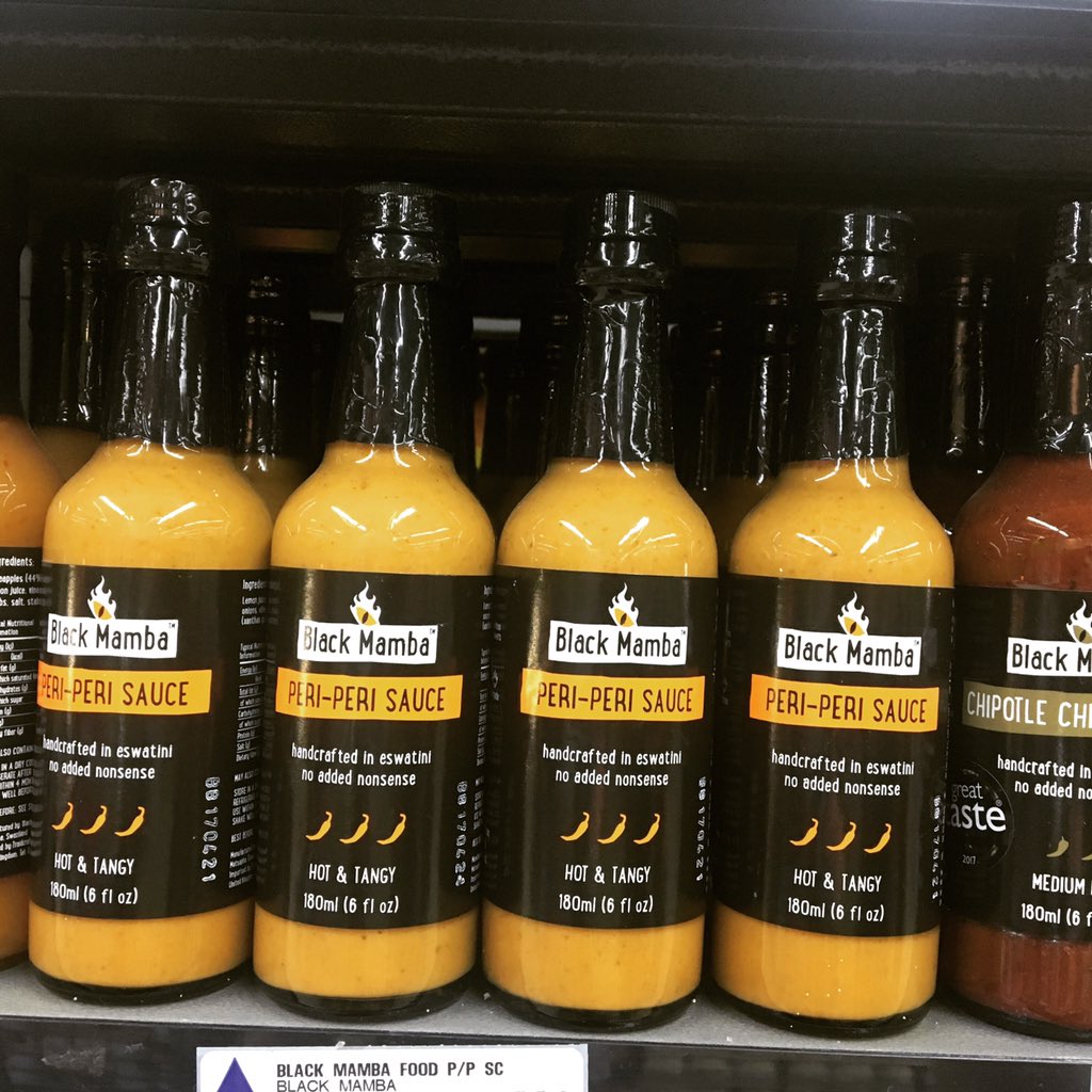 BlackMambaFood's tweet photo. #HOT of the press! Our #hotandtangy and #yummylicious Black Mamba #periperi sauce is now available @picknpay for all our #chilliheads in #Eswatini! You haven’t really lived until you taste one of these beauties in your #prego roll! #BlackMamba #ethicalfood #foodgasm https://t.co/tbX0Dncf4S