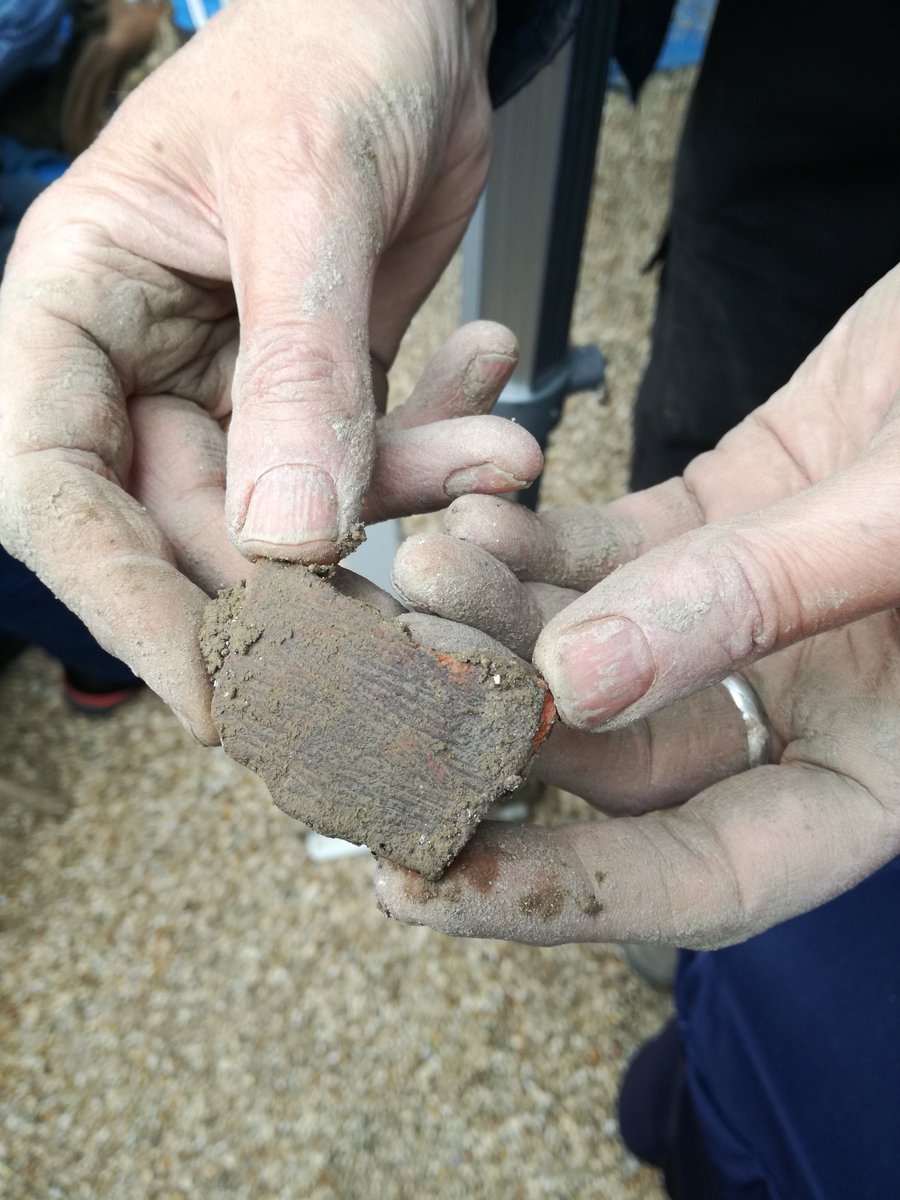 SalisburyMuseum's tweet photo. Around 80cm deep into the ground, Lorraine and Phil have found some medieval pottery! Lorraine reckons this particular piece comes from Laverstock, near Salisbury. An exciting discovery on #PhilsDig today at @SalisburyMuseum #Salisbury #WAat40 #medieval https://t.co/hBcQ5F0a1G