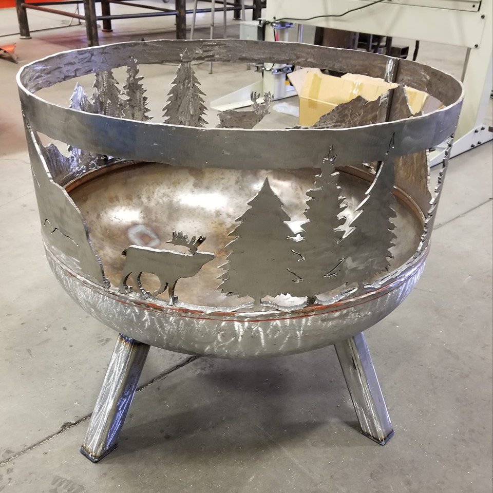 pencollege's tweet photo. A PC welding student created this great fire pit which will be on display in our Welding Club booth at the Sequim Logging show, Saturday May 11. Come by and support the club! #PCWelding #PCProud https://t.co/kYIChaaBoF
