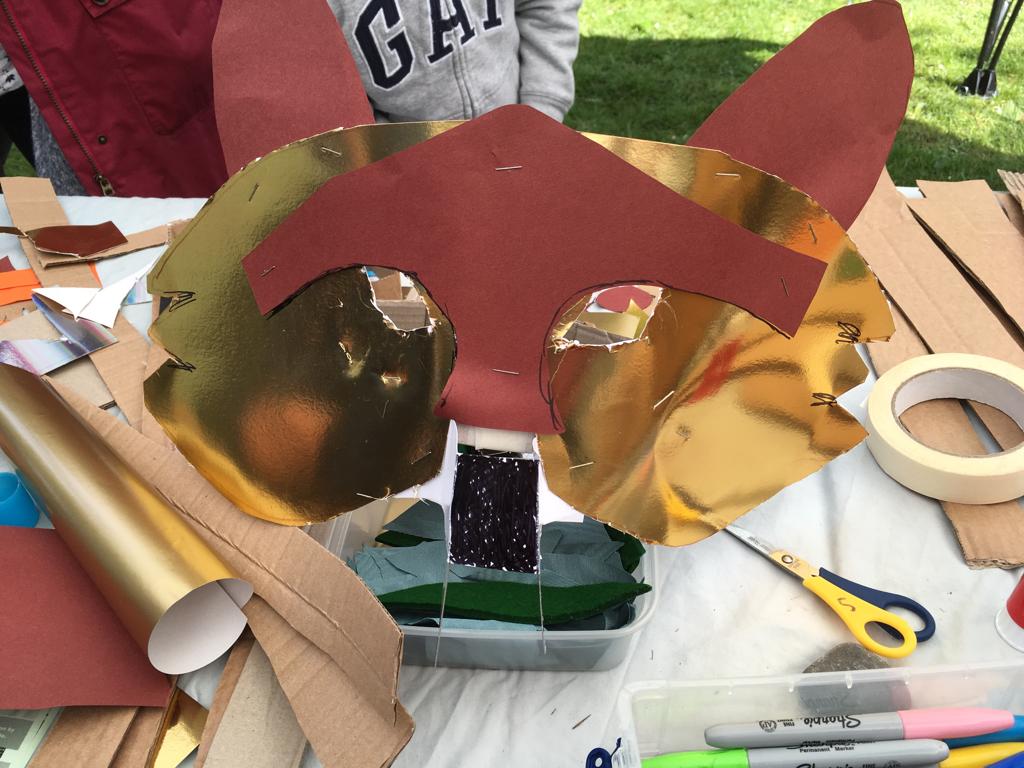 TwoLeftHands3's tweet photo. A great day at #buxtonspringfair making masks for #buxtoncarnival to accompany the giant puppets. Slugs, foxes, rabbits, owls, butterflies were all made by folks who stopped by. https://t.co/q5illsr5P1