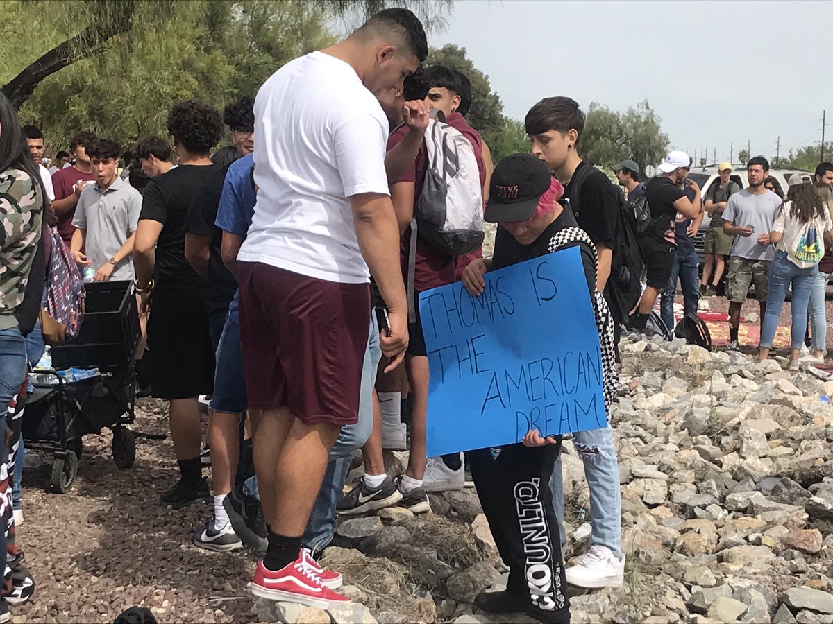 RafaelCarranza's tweet photo. HAPPENING NOW: Some 200 students from Desert View High School walked out this morning to protest detention of a classmate by Border Patrol. They’re rallying outside the Pima Co Sheriff’s Dept, will be holding a press conference. https://t.co/zWE2iFtZtW