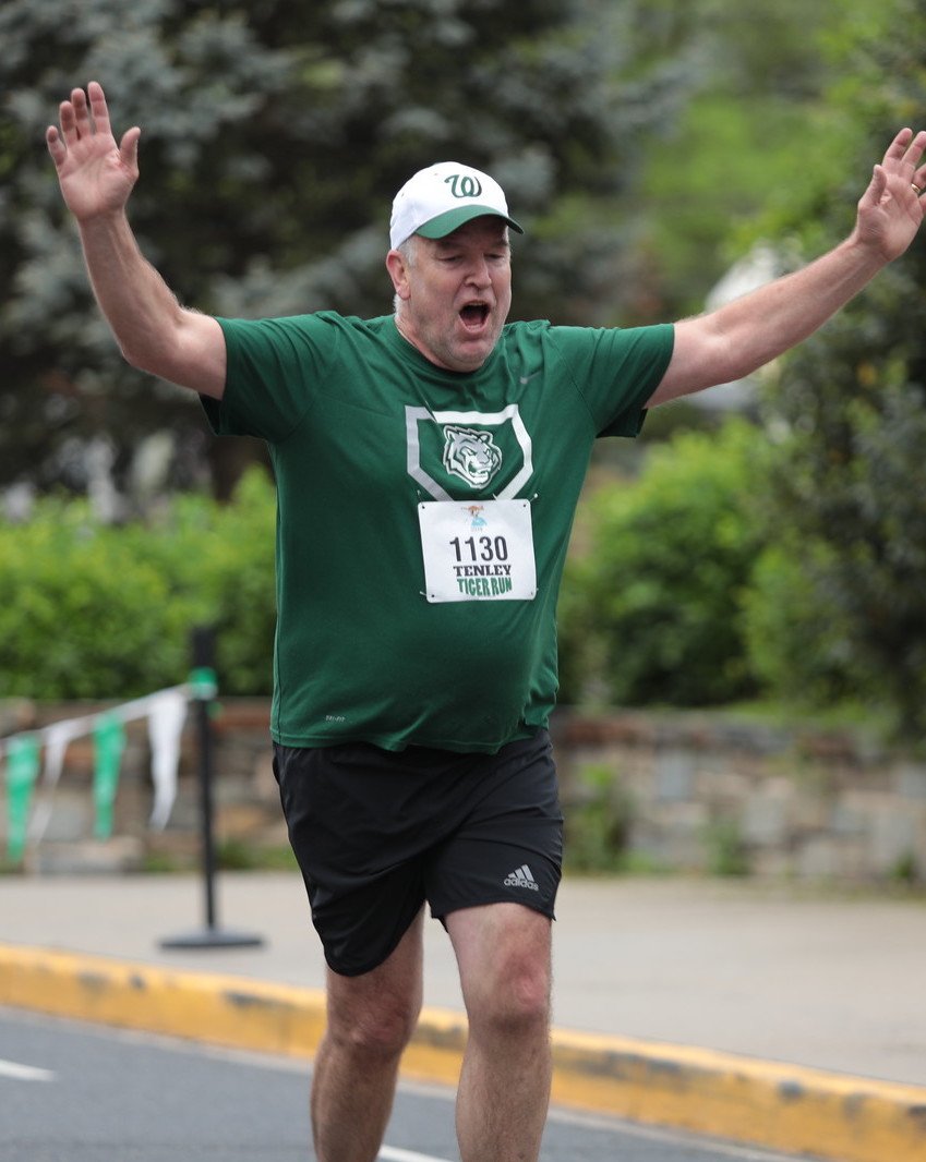 WilsonVBaseball's tweet photo. The @TenleyTigerRun race photos are out and here's AD @GoreMitch wearing some @WilsonVBaseball pride while running. We're not sure but we think he's winning the race at this point. https://t.co/NXn1pibQGA