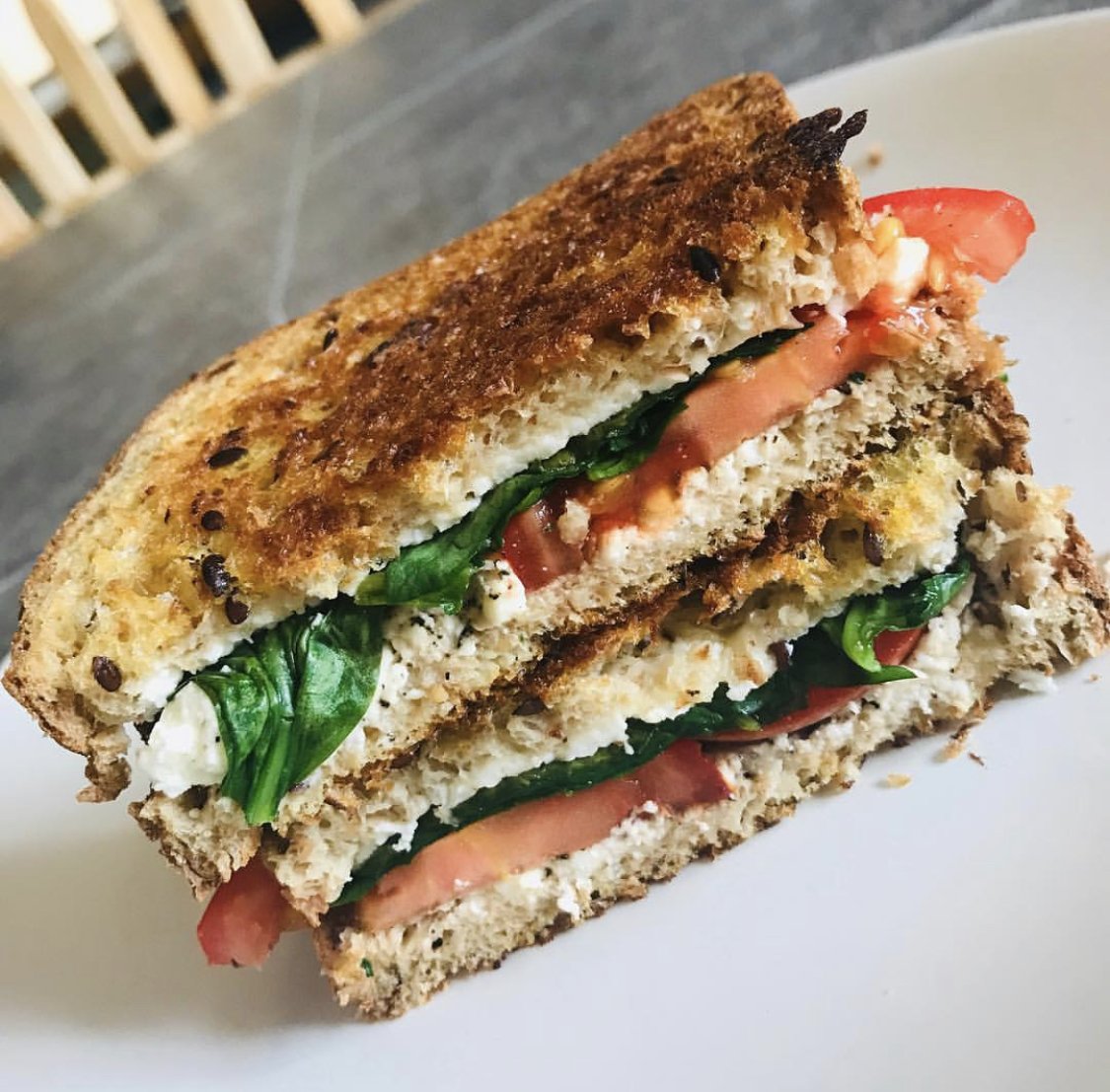 MightyVine's tweet photo. #MightyChef Monday brought to you by this Mediterranean style sandwich. In it is feta, spinach, MV tomatoes 😉  and flax seed bread- we can't wait to whip this up! https://t.co/C0vVWjT8XZ