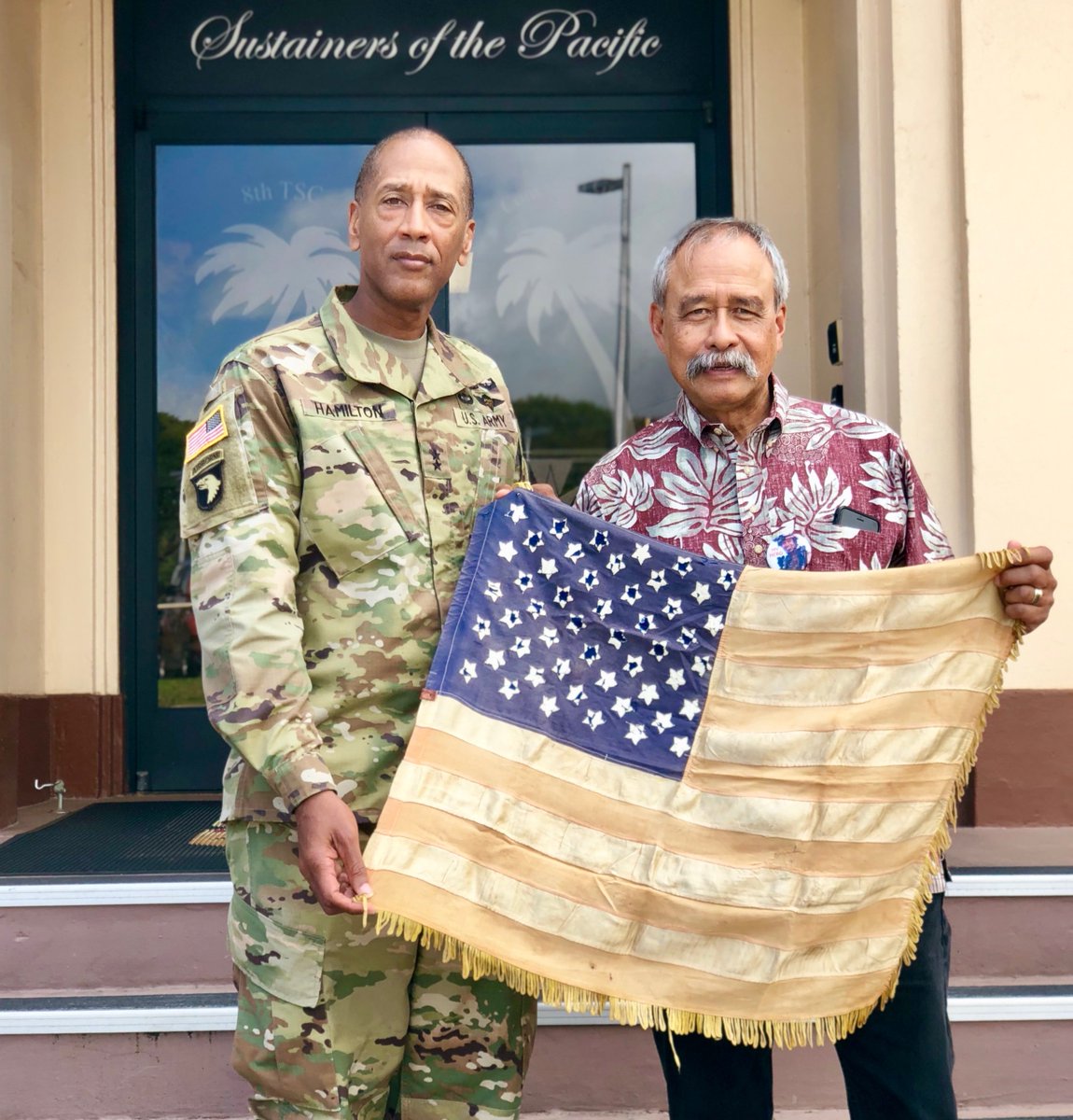 8thTSC's tweet photo. The #warrior spirit moved the 8th TSC as Maj. Gen. Charles Hamilton hosted Civilian Aide to the Secretary of the Army for East Hawaii Mr. Allen Hoe! He shared his flag from Vietnam. His son 1st Lt. Nainoa Hoe, also carried it on his last patrol in Iraq where he lost his life. https://t.co/hswhFYdT5q