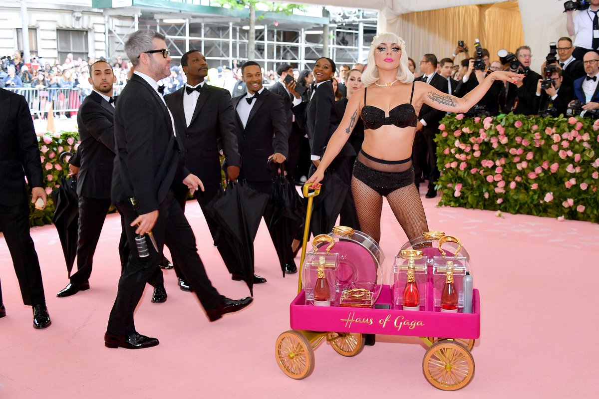 spangly panties, spangly bra, and, of course, a small pink wagon with gold ...