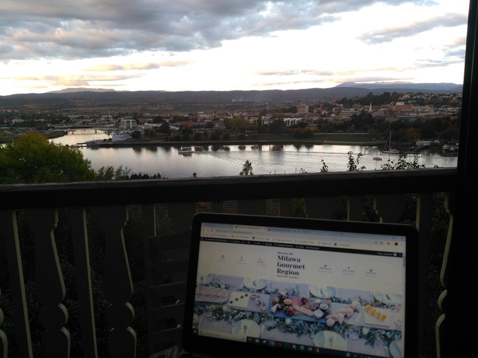 DigitalGoldAU's tweet photo. We're oh so lucky to be able to travel with our work to where ever there is WiFi.👌👩‍💻 Pictured here overlooking #Launceston, #Tasmania and a sneak peak of the #MilawaGourmetRegion's brand new #website coming very soon!! 🚲🧀🍷#MobileOffice #WorkAndTravel #WebsiteDesign #Digital https://t.co/kSzj0luQBU