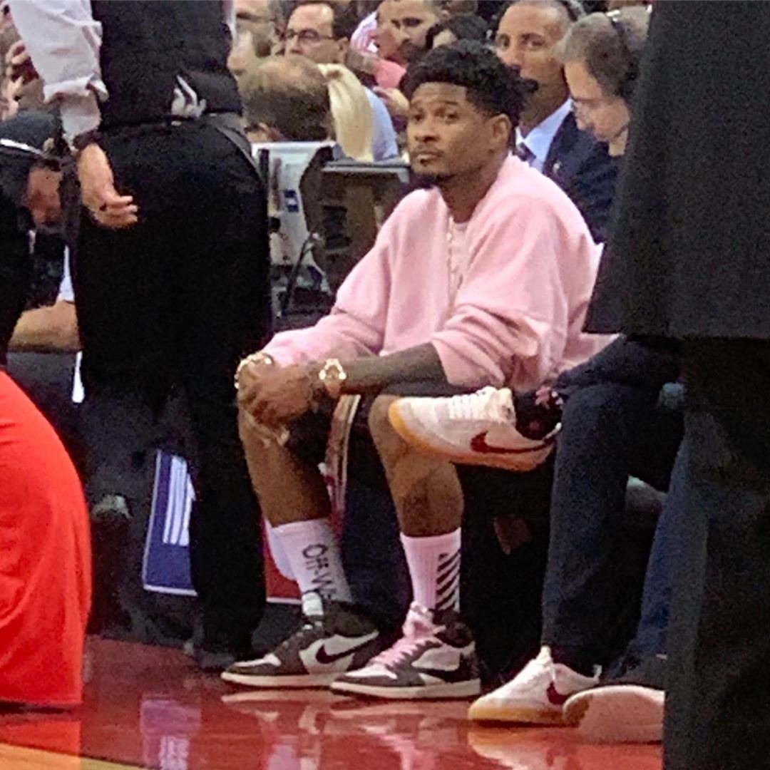 Usher wearing Travis Scott x Jordan 