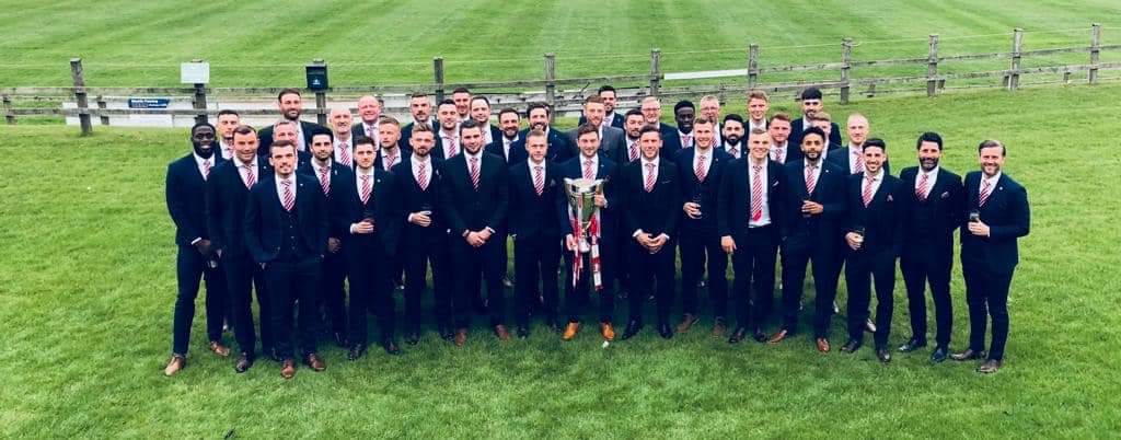 GereLincoln's tweet photo. So proud to have supplied these winners @LincolnCity_FC with @marcdarcysuits for their presentation evening. Incredibly inspiring evening! #UTI #ImpsAsOne #geremenswear #officalLcfcsuit https://t.co/WXkimOesVL
