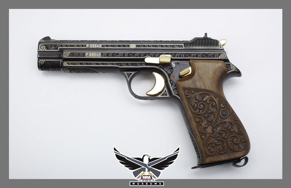 NRA_museums's tweet photo. #GOTD - Classic Sig P210. With elaborately carved wood grip panels and full coverage engraving, this semi-automatic handgun really makes a statement as a spectacular piece in the Robert E. Petersen Gallery in Fairfax, VA. #history #nramuseums https://t.co/J7g9Ym3HLR