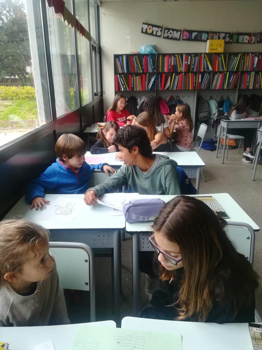 EscolaThauSC's tweet photo. Padrins i fillols treballant en Pompeu Fabra, el personatge de l'any. #1rpri #1rESO https://t.co/Alzjcdwtb3