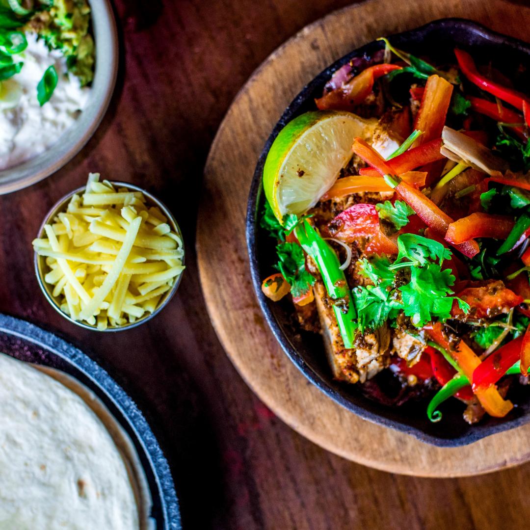 Turn up the heat every Tuesday with all-you-can-eat sizzling and delicious chicken and beef combo fajitas!
