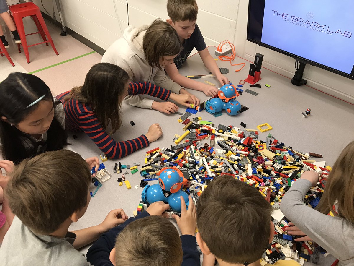 MrPicard_HES's tweet photo. The trash in the #SparkLab is out of control. Good thing @MrsWhitelock &amp; @MrsCollins3rd classes are willing to help after learning about Earth Day and watching Wall-E. Using our @WonderWorkshop robots to get the trash into the recycling zones. #HESTEM #HappyHillendale #EarthDay https://t.co/Ki46IeZF29