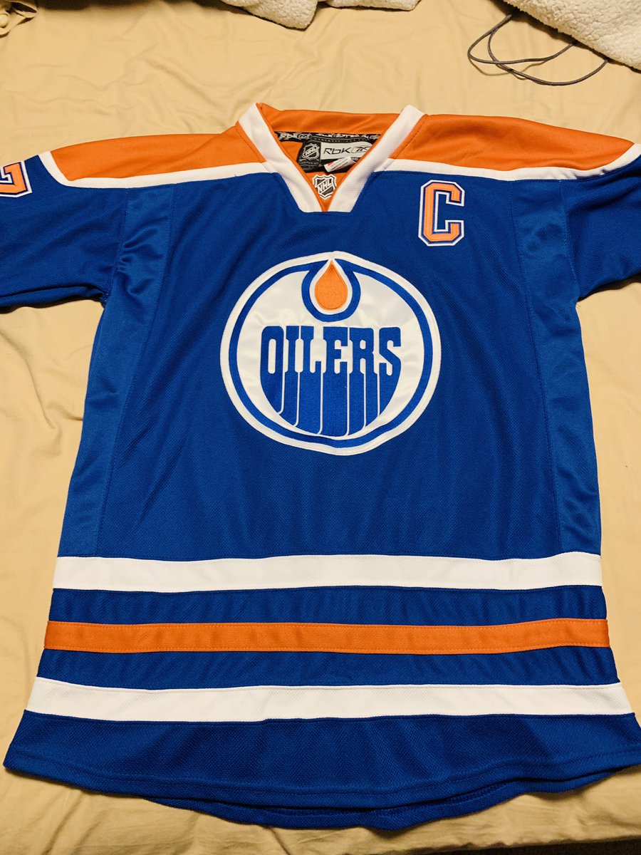 NikoMichals's tweet photo. Giving away a Connor Mcdavid Jersey. It’s a Fake but a really good one. Anyway if you or someone you know wants some free Oiler apparel, retweet and follow me and I’ll choose someone at random to get this for free! https://t.co/gxQSJKk5Lc