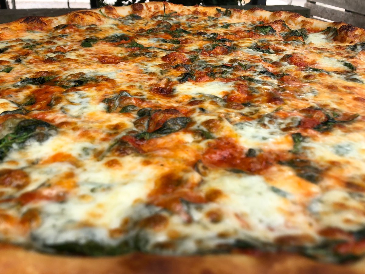 Tomorrow is #pizzapoetry19! Every order comes with a poem by a young writer from <a href="/826neworleans/">826 New Orleans</a>, and we're donating 20% of all sales to the organization. This here handsome boy is our vodka sauce pie. Ваше здоровье!