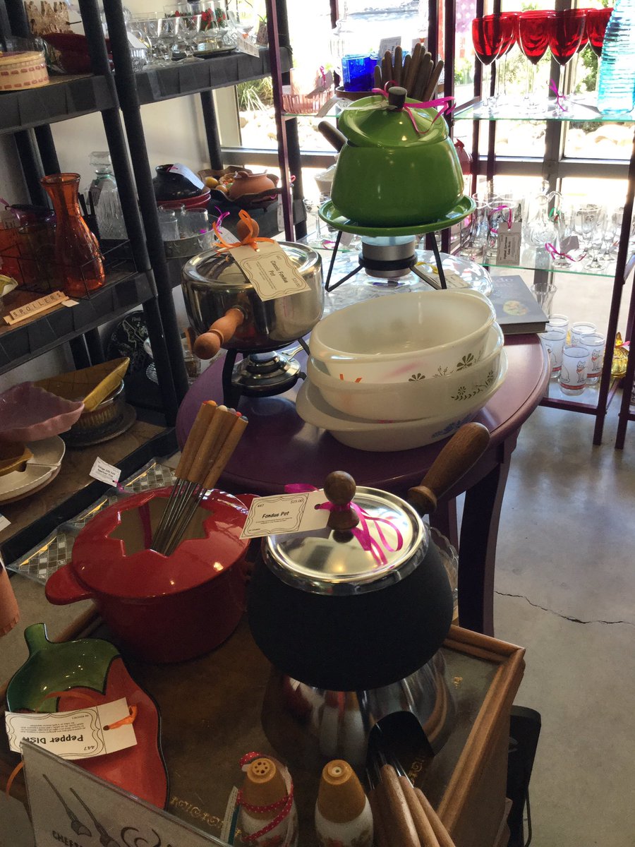 New items in our booths in Midtown Mercantile Merchants in Tucson Arizona. Giant Cabernet bottle, amazing MCM bamboo glasses, Fundue and fun rose bistro set. #shopping #MidCentury #bareware #teacups #bistroset #bar #antiques #unique #fun #fondue