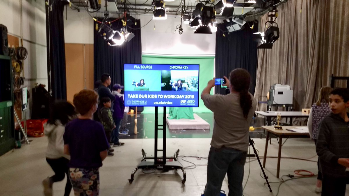 UWVideo's tweet photo. Kids got to experience the fun of chroma keying in our studio today for the @UW Take Our Kids To Work Day. Thanks to all the kids and parents who joined us and thanks to @UWWholeU for organizing this fun-filled day for the kids! #TakeOurKidsToWorkDay #greenscreen #chromakey https://t.co/dLg1s63EXJ