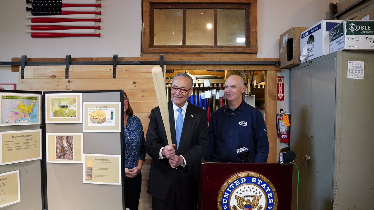 Senator Schumer holds a bat as he speaks at Cooperstown Bat Company. (Photo by the Senate Democratic Media Center)