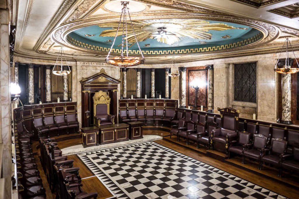 8\Upon further investigation, they discovered a majestic Masonic temple hidden behind false walls.