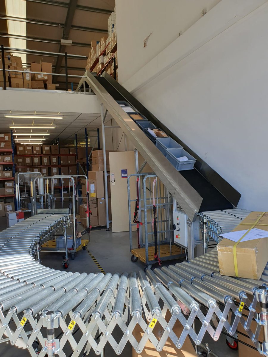A mail order facility has new kit commissioned. A COB-140 decline #conveyor complete with gravity roller at the top on a mezzanine floor and expandable gravity roller at the bottom. Moving product from one level  to another made much easier! #UKmfg #ukengineering