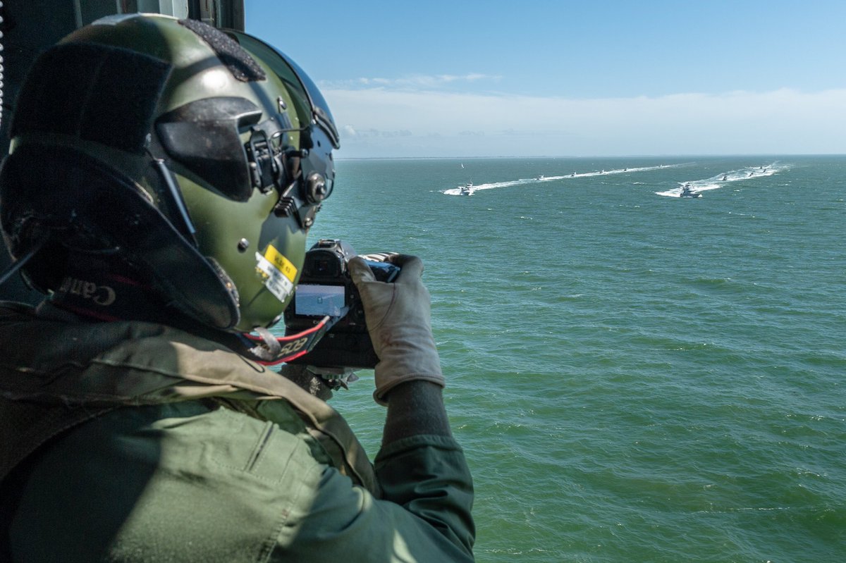 ShaunRoster's tweet photo. The view from a @RoyalNavy #Merlin #helicopter of #814NAS @RNASCuldrose of 14 #Archer Class #Patrol #Vessels buzzing @USCG #USCGEagle in the #Solent https://t.co/56LymQByxD