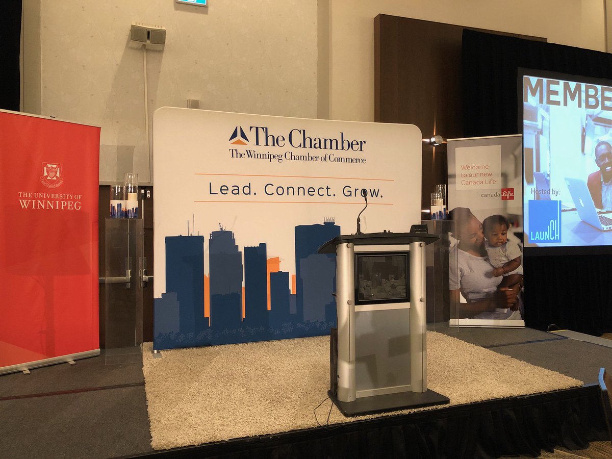TheWpgChamber's tweet photo. We’re all set-up and ready to go for today’s luncheon with Chris Kirby, Senior Technology Leader with @IBM. We’re excited to learn the ins-and-outs of blockchain with our Chamber members and guests. Thanks to the @EVENTSBYEMMA for always making the stage look great! https://t.co/8H1syJliAW