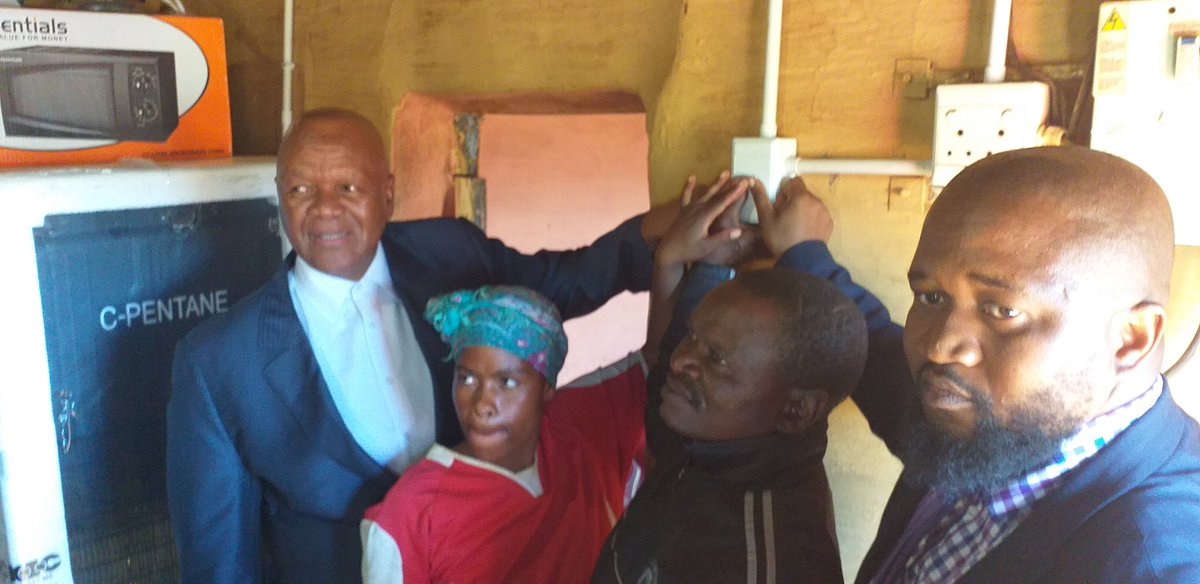 Energy_ZA's tweet photo. Minister Radebe symbolically switching on a house in #Chibini of one of the beneficiaries of the more than 1000 houses electrified y the Department in partnership with #Eskom in Matatiele @radebe_jeff @Energy_ZA #teamenergy #GrowSouthAfrica https://t.co/sWghnTk3ej