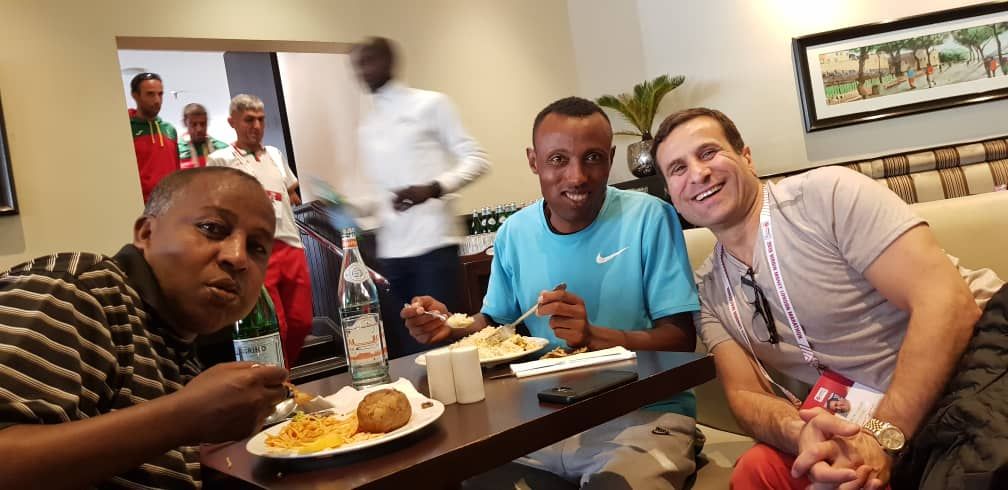ShuraKitata's tweet photo. Having lunch with my coach @HajiAdilo and my manager @ESMINTL, Hussien Makke. I am happy for having you and your great support. Looking for amazing race on Sunday @LondonMarathon 

#LondonMarathon #Nike https://t.co/J0IfCHdOt1