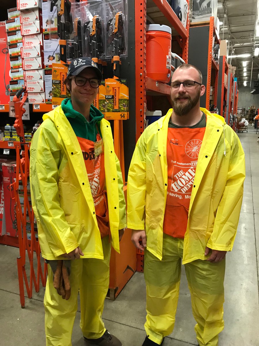 Drake and Andrew, the Happy Bananas , working the mulch trucks in the downpour!!!