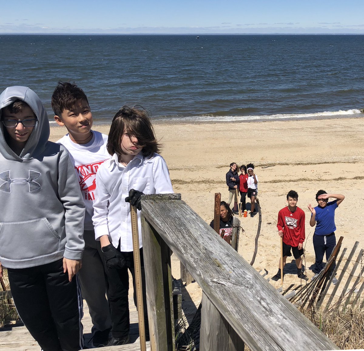knox_science's tweet photo. What does 10ft of #sealevelrise look like locally? What’s the impact to the @knoxschool? What’s the impact to nearby #LongBeachTownPark &amp; the peninsula? Our middle school scientists sought to make the local impact of #climatechange real by going to the waterfront w/meter sticks! https://t.co/iVq0s3UVcG