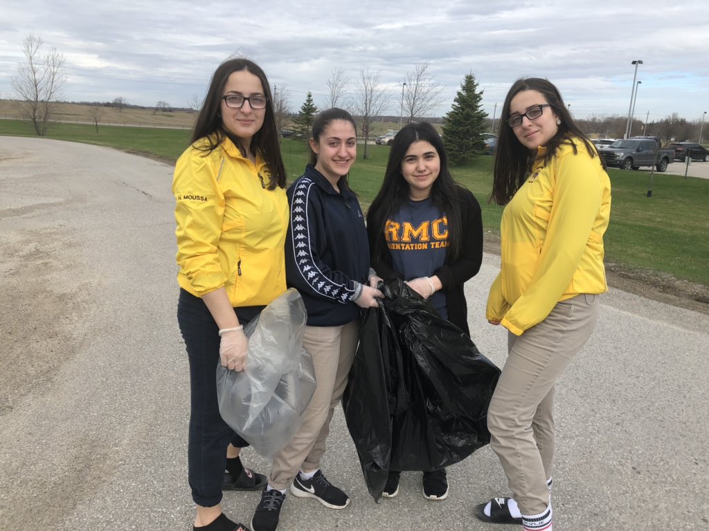 GoldsackLisa's tweet photo. @RMC_Titans physed students cleaning up the school grounds as part of #519CleanGreen #20MinMakeover #EarthDay https://t.co/ukkHxeeDaM