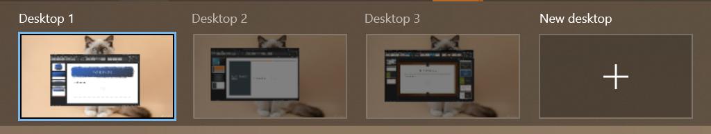 Showing 3 virtual desktops in Task View with different presentations set up on them