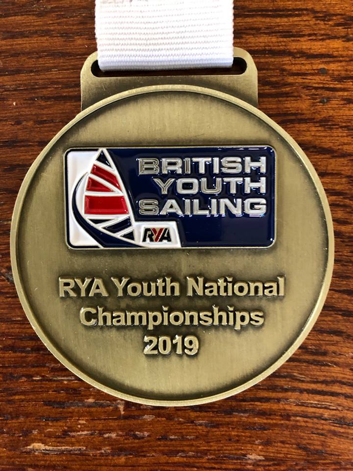 BenPurrier's tweet photo. Winner's Medal! RYA Youth Nationals in the Topper. Big thank you to everyone making this possible @RYAYouthSailing @Rooster_Kit @WPNSA & @AinslieBen for the encouragement #sailing #dorset #yn2019 #ryayouths https://t.co/TbK146Nq3c