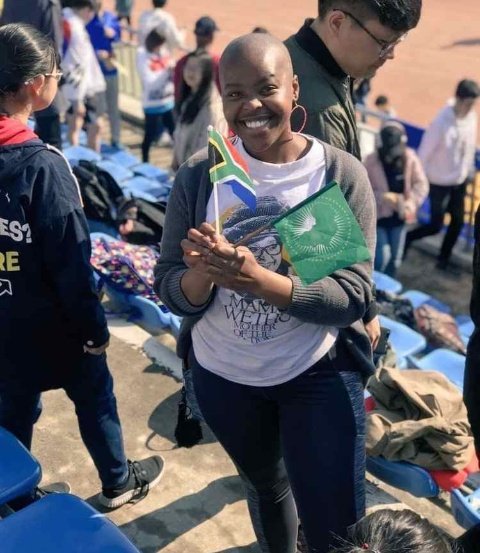 MYANC's tweet photo. Young South African Gender Activist, Comrade Isasiphinkosi Mdingi 
(@Endinakokulue) has answered the #ThumaMina call, and is casting her first international vote today in Beijing, China

#SAElections2019 
#GrowSouthAfrica 
#FreedomDay 
#Democracy25 https://t.co/WEoXszFTO0