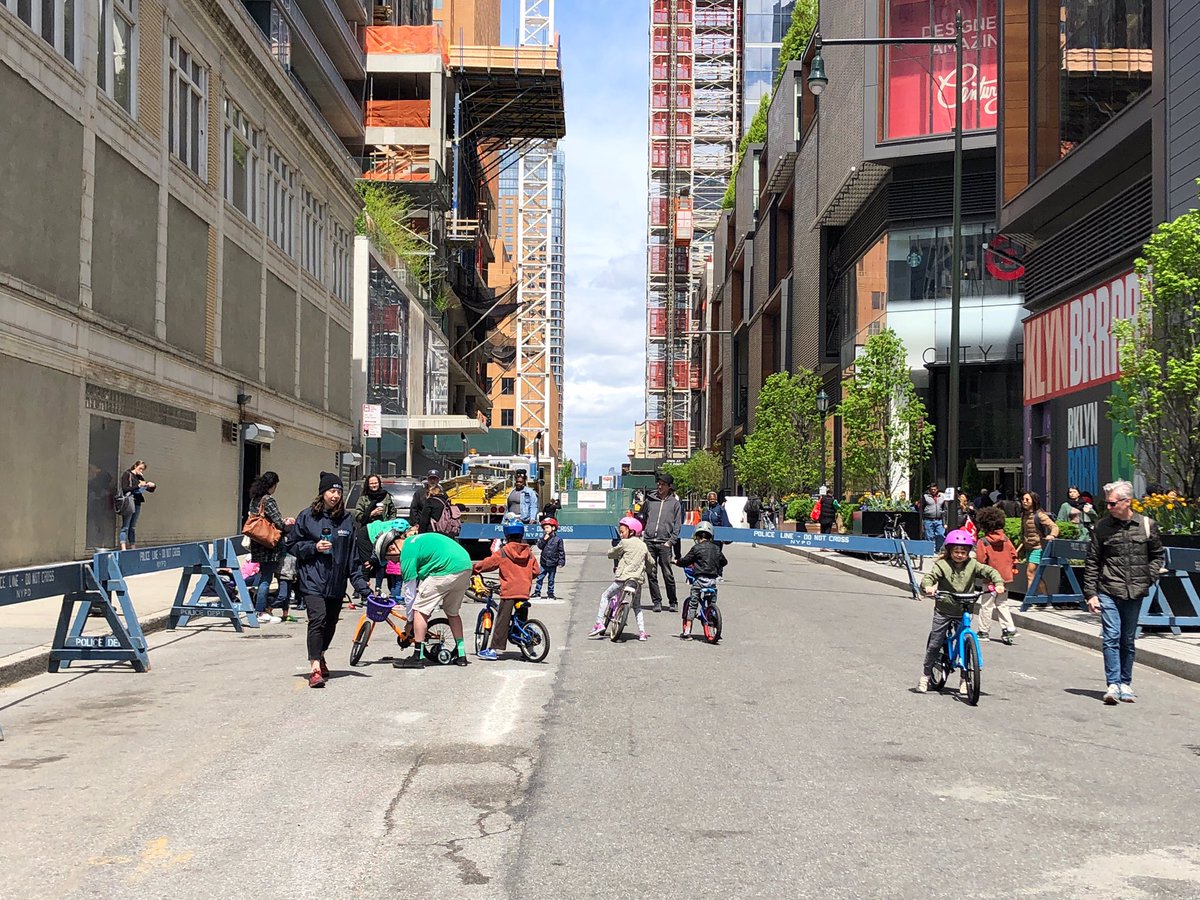 Kids bike on a street closed to cars