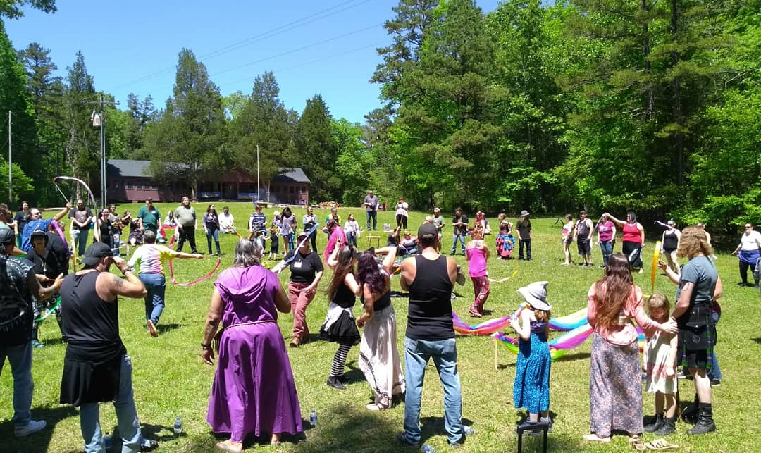 NCPCOW's tweet photo. Main Ritual today at Big Beltane Brouhaha was so special for our 20th year! We looked back on the great rituals of the past while our hearts are in today and our minds on the future! #beltanebrouhaha2019 #BeltaneMainRitual https://t.co/9TEkCabATs