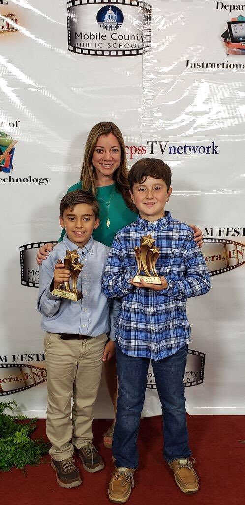 BethFields1's tweet photo. Brady and his friends worked so hard on their film for the Film Festival and words can’t even express how PROUD of them I am for receiving Best In Show!!! Thank you MCPSS for this great event! They really enjoyed the paparazzi and the red carpet! #mcpssfilm2019 @MobilePublicSch https://t.co/L2IVzSr7sb
