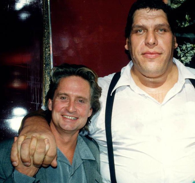 Super 70s Sports Andre The Giant Holding Hands With Michael Douglas Because Why The Hell Not