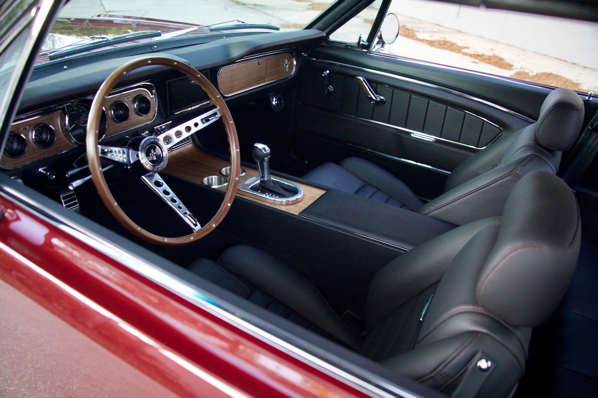 This is production car #31, a 1966 Mustang Convertible in Vintage Burgundy Metallic with Black Nappa leather interior.  Custom Nappa leather interior with burgundy stitching that matches perfectly the exterior.  
#revologycars #mustangstory #reproductionmustang #ford #mustang